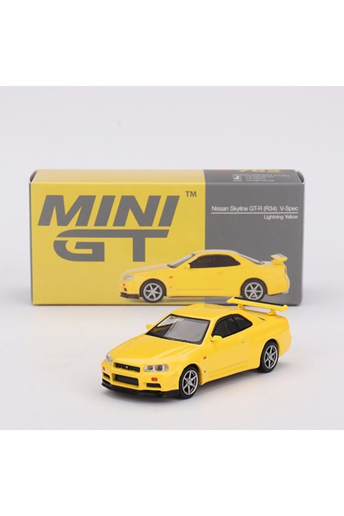 Mini GT 1:64 Nissan Skyline GT-R (R34) V-Spec – Lightning Yellow Model Araba Mini GT 1:64 Nissan Skyline GT-R (R34) V-Spec – Lightning Yellow Model Araba