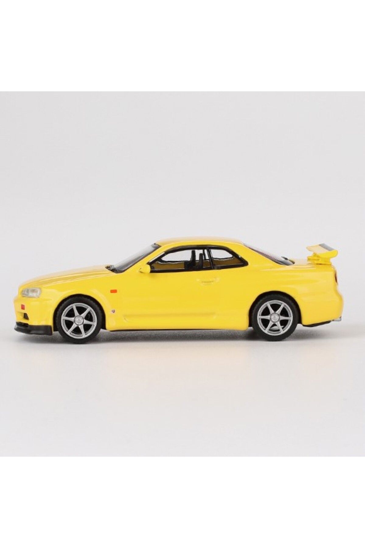 Mini GT 1:64 Nissan Skyline GT-R (R34) V-Spec – Lightning Yellow Model Araba Mini GT 1:64 Nissan Skyline GT-R (R34) V-Spec – Lightning Yellow Model Araba