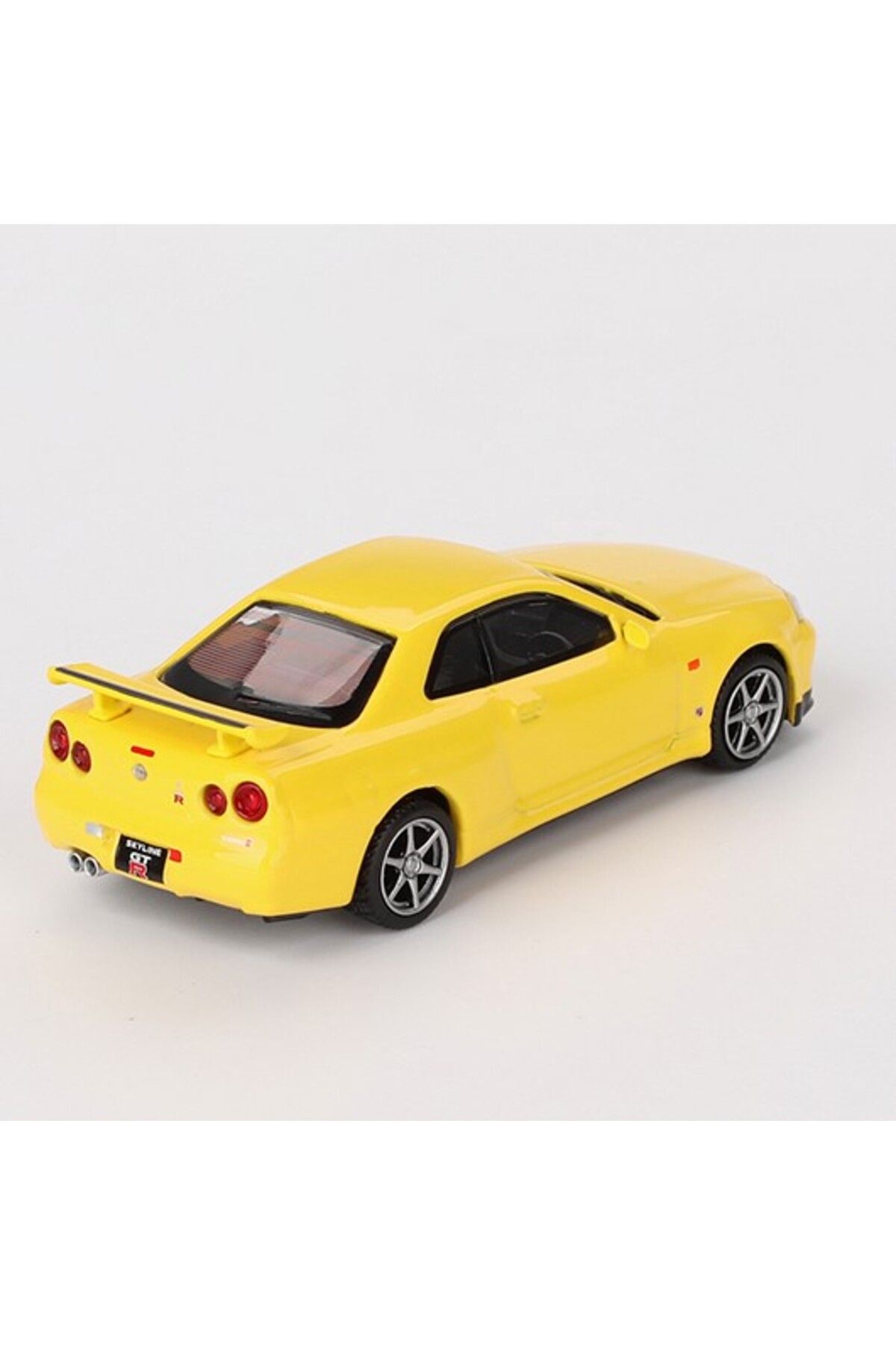 Mini GT 1:64 Nissan Skyline GT-R (R34) V-Spec – Lightning Yellow Model Araba Mini GT 1:64 Nissan Skyline GT-R (R34) V-Spec – Lightning Yellow Model Araba
